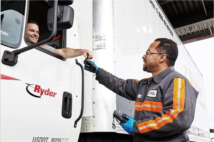 Ryder maintenance worker and driver with a truck