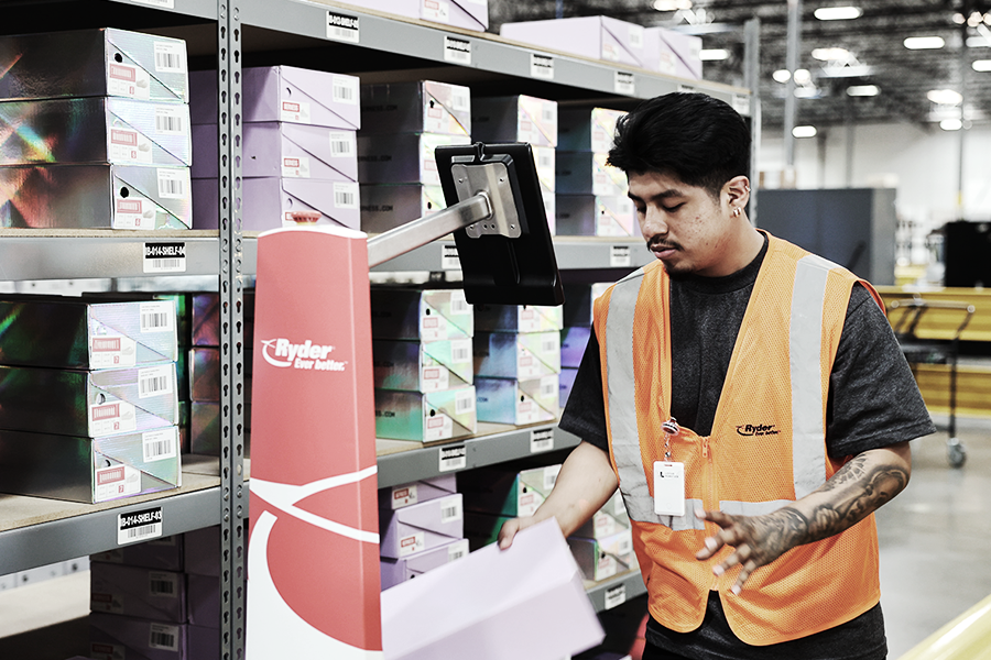 Ryder employee working in a warehouse