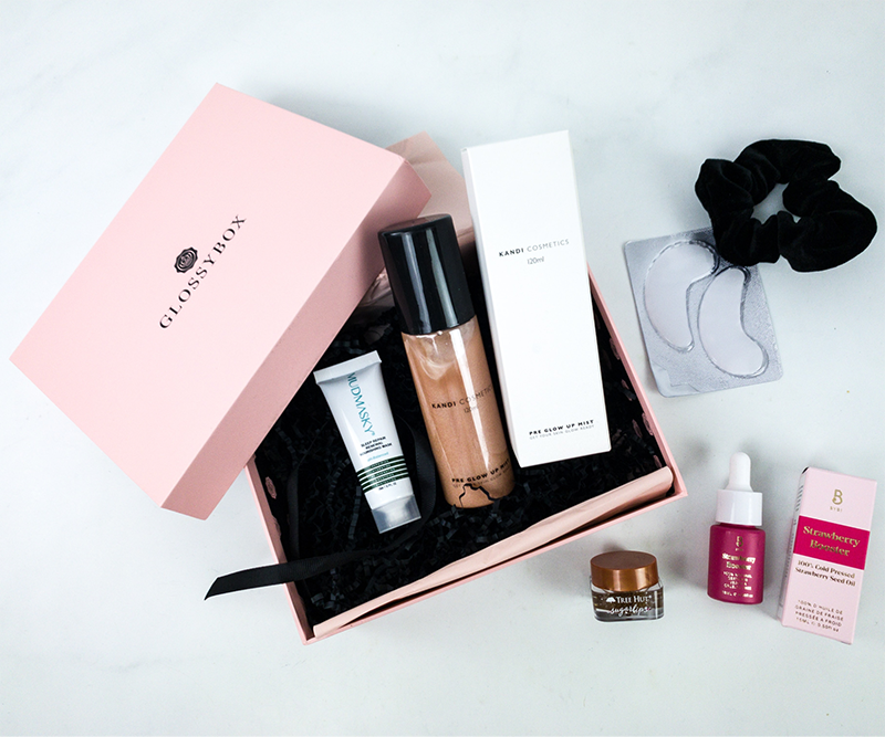 glossy box with various beauty products