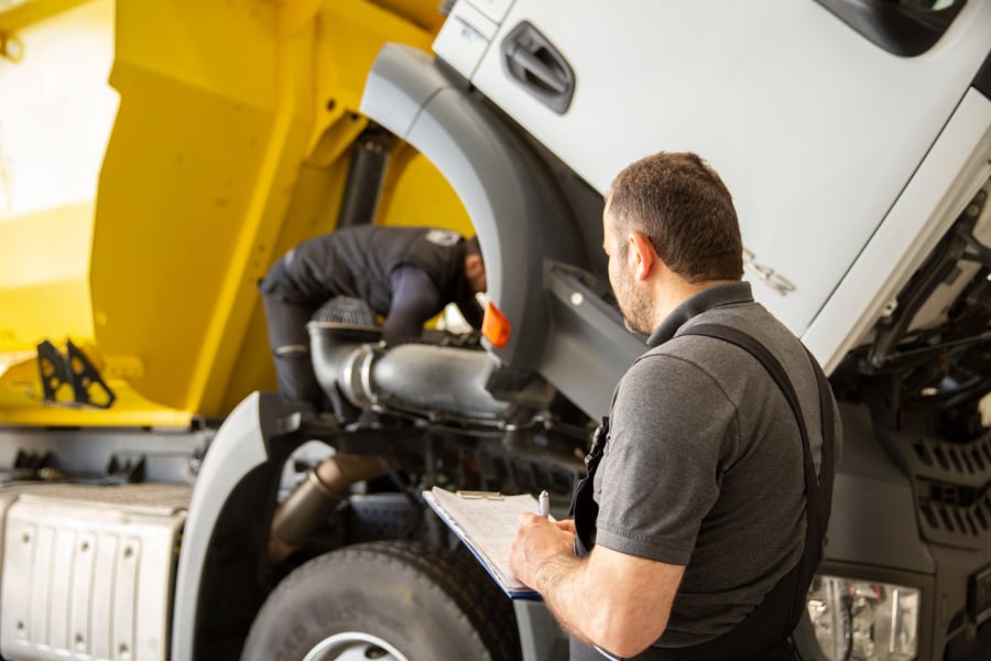 technician working on a commercial truck