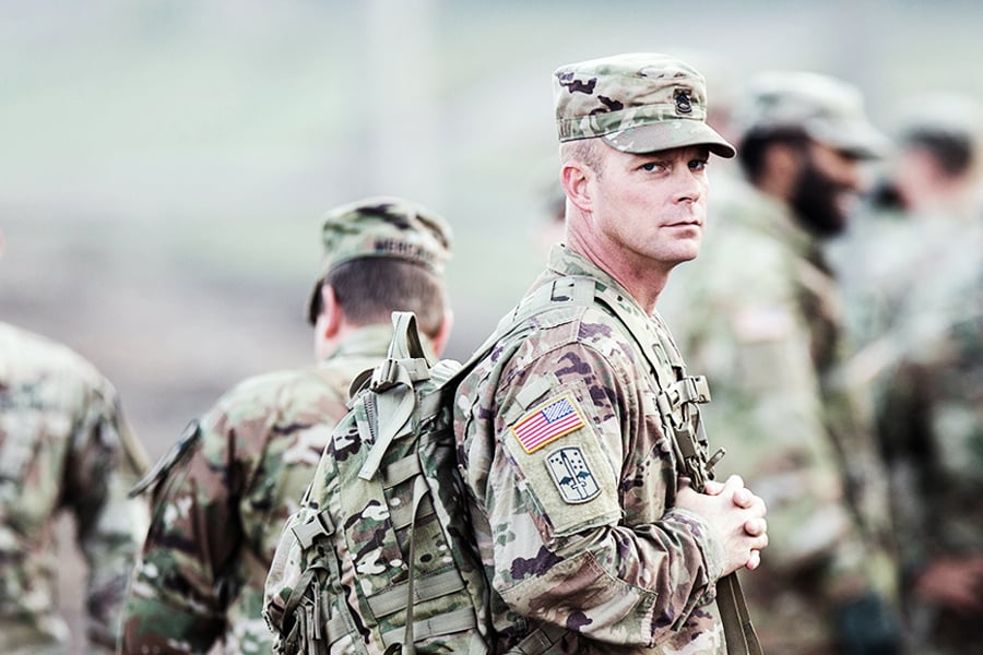 Uniformed military service members representing Ryder's veteran hiring program