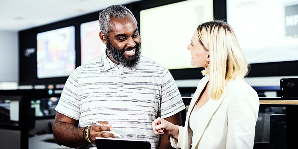 Ryder Truck Leasing TCO A ryder employee showing a customer how to use our truck leasing TCO tool