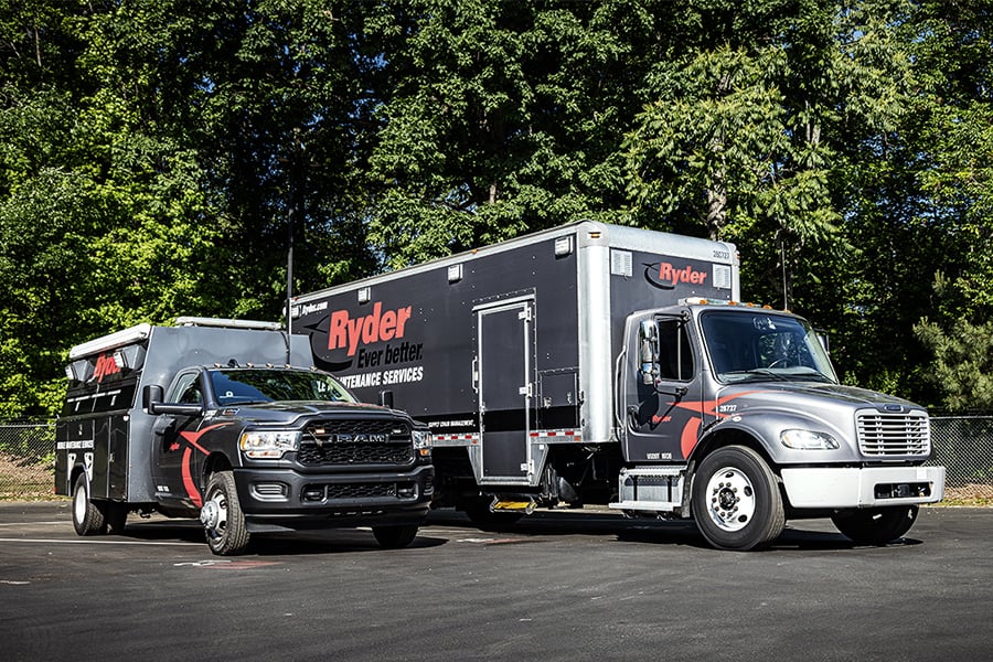 Two Ryder mobile maintenance trucks lined up