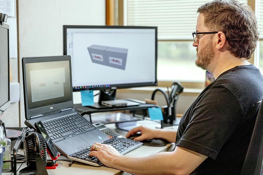 An engineer designing a product display