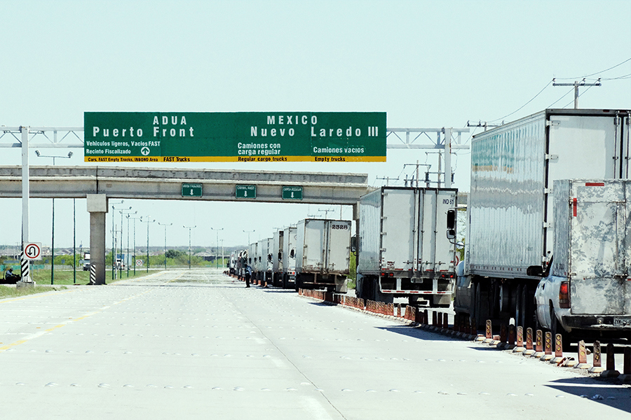trucks crossing the border from US to Mexico for nearshoring services