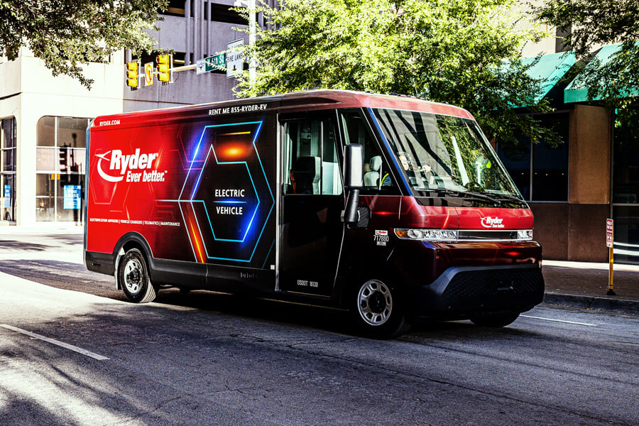 A Ryder electric vehicle making deliveries in the city A Ryder electric vehicle making deliveries in the city