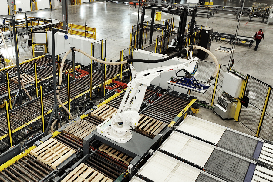 Robotic automation system moving goods in a Ryder warehouse