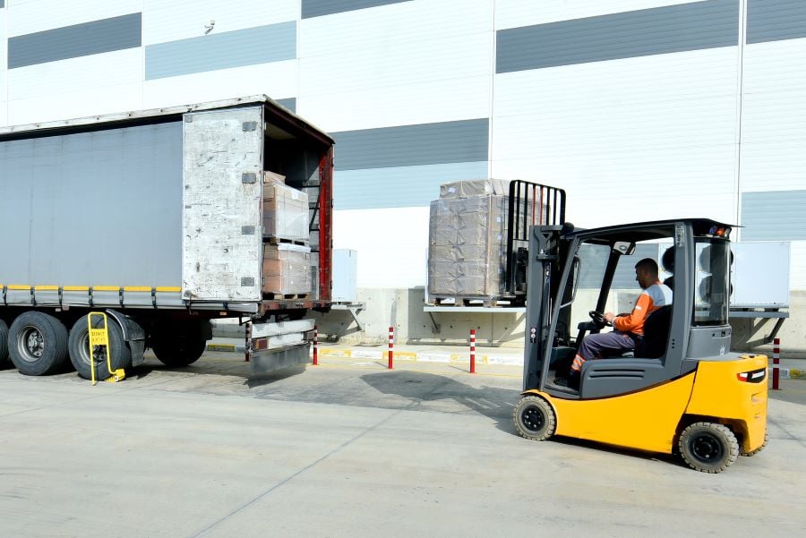 forklift loading a truck forklift loading a truck